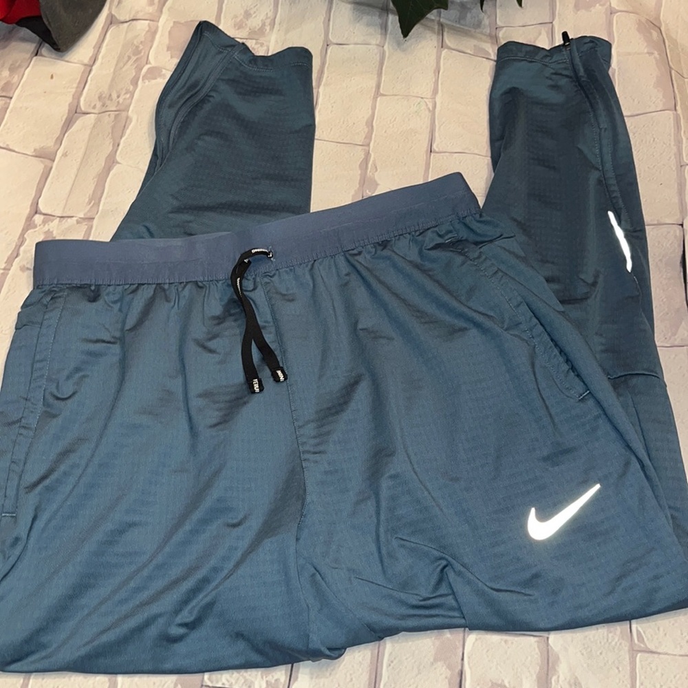 NIKE DRI FIT running pants size medium